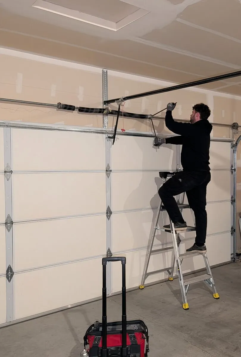Boise Garage Door Pros technician at work on a garage door